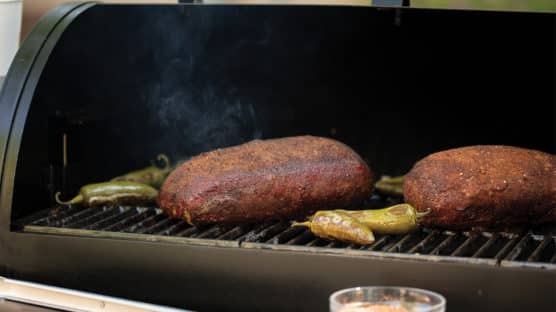 Two King Cut top sirloin steaks on smoker