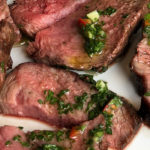 sliced top sirloin with chimmichuri sauce