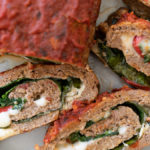 Delicious slices of Italian meatloaf stuffed with spinach, provolone cheese and roasted red pepper
