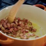 Cooking pancetta for creamy orzo pasta with pancetta for an Italian-style steakhouse filet migno dinner