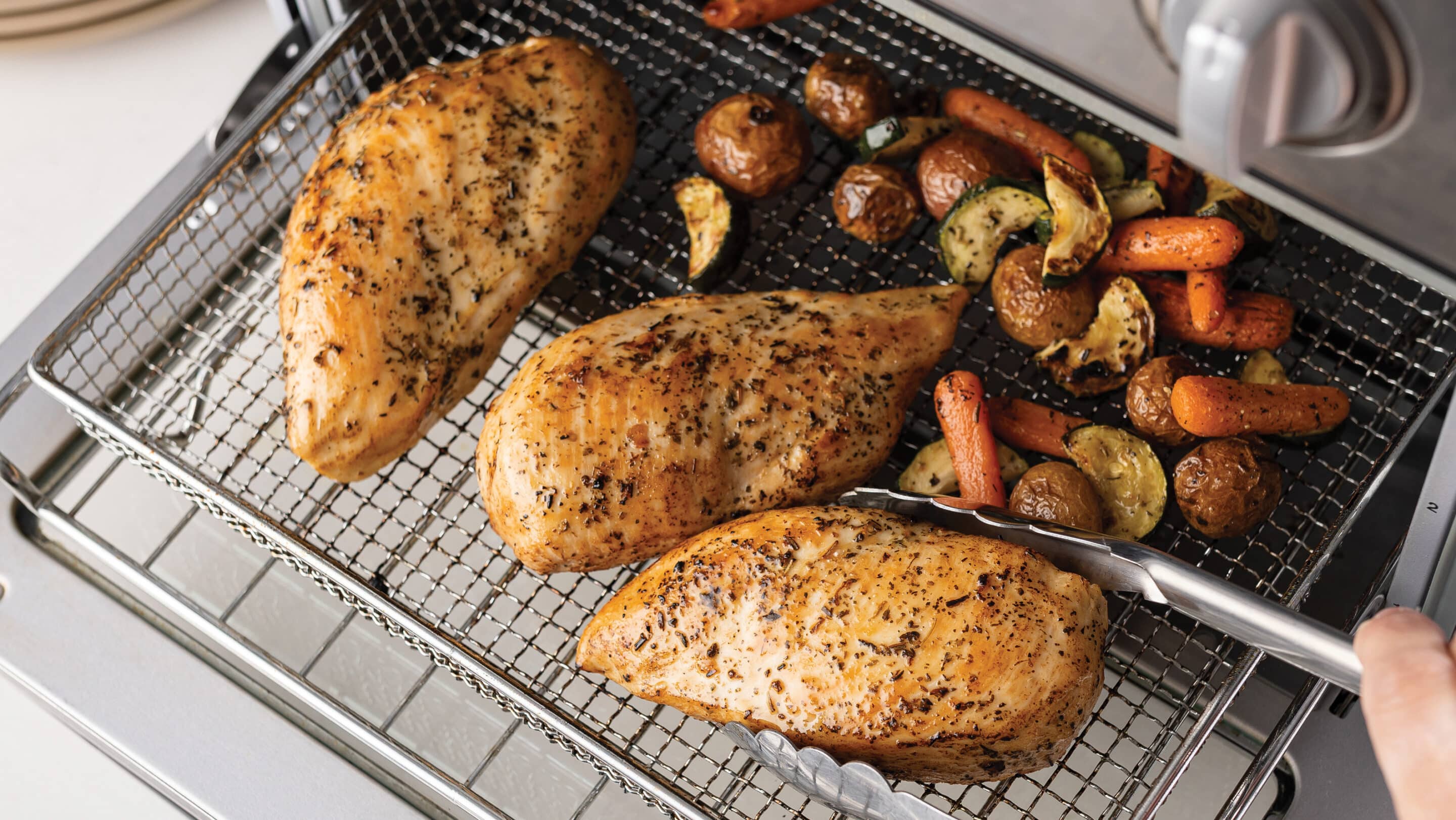 3 chicken breasts and veggies in the air fryer