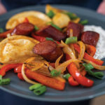 Sheet Pan Pierogi with Sausage Onions and Peppers Recipe