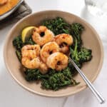 Tan bowl with sheet pan broccoli and shrimp scampi