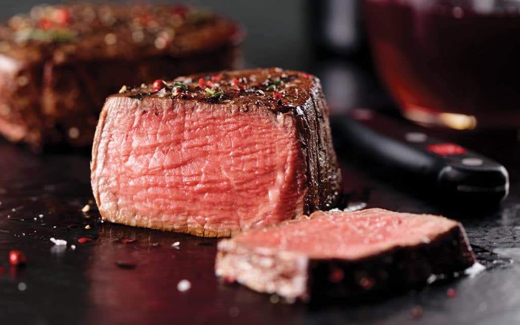 sliced filet mignon cooked medium-rare