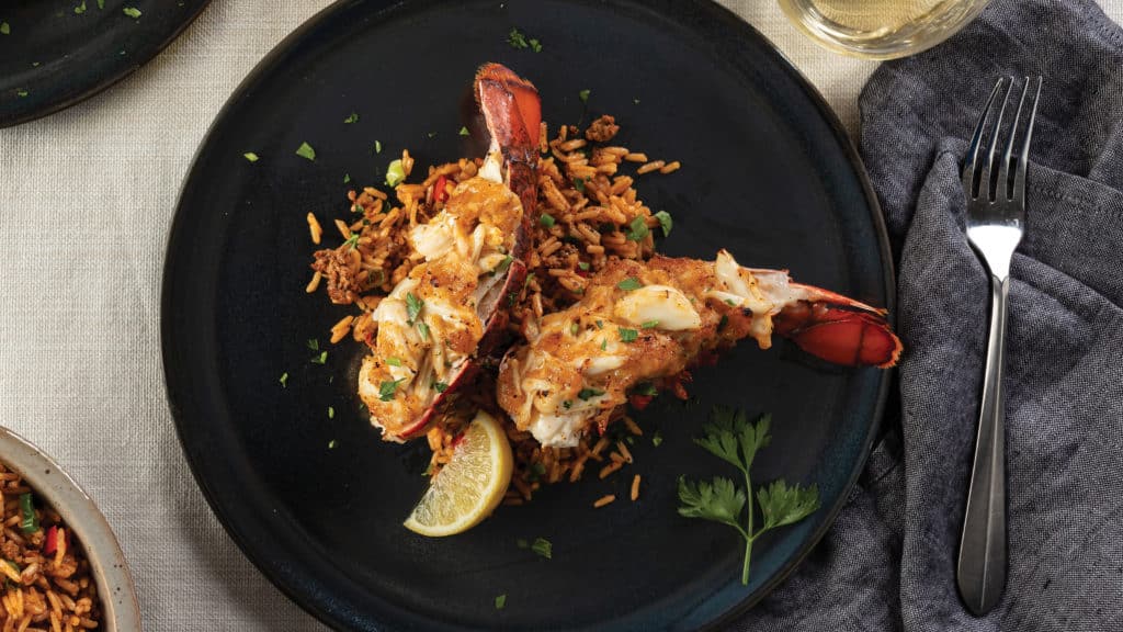 crab stuffed lobster on plate