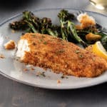 roasted halibut steaks with a lemon garlic herb crust on plate