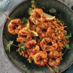 Grilled Lemon Chipotle Shrimp Skewers with Spanish Rice on plate