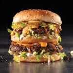 Double cheeseburger with pickles, special sauce, lettuce, sauteed onions, and melty cheese