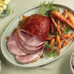 Easter dinner with Honey glazed ham, garlic parmesan carrots, and red smashed potatoes.