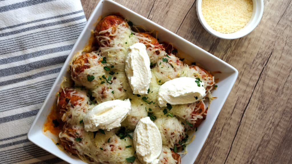 meatball ricotta bake in a white casserole dish